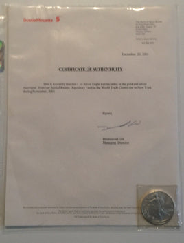 9/11 Bank of Nova Scotia $1.00 silver recovered from World Trade Center.